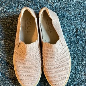 A pair of soul Naturalizer nets sneakers with a leatherback